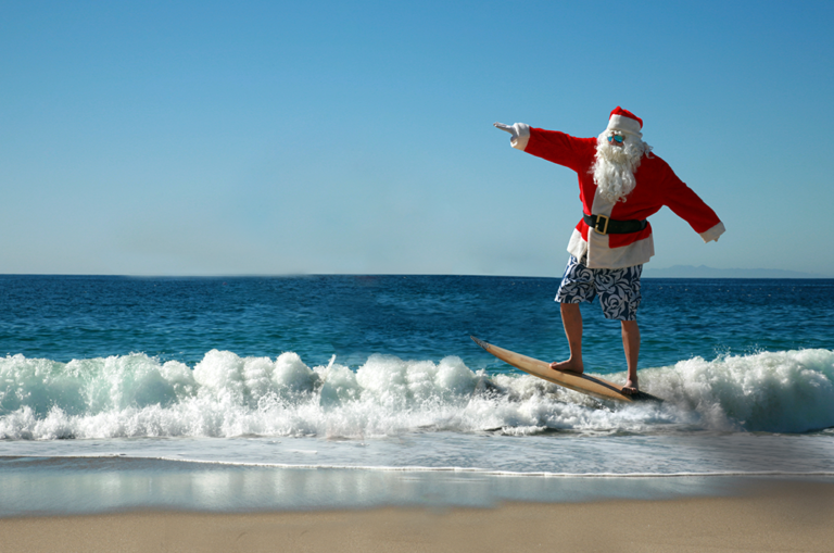 Hundreds of Santas surf on Florida’s Space Coast on Christmas Eve